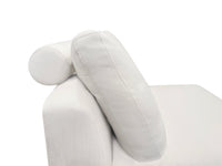 A beige luxury sectional sofa with multiple cushions, featuring a subtle curve design, set against a white background.