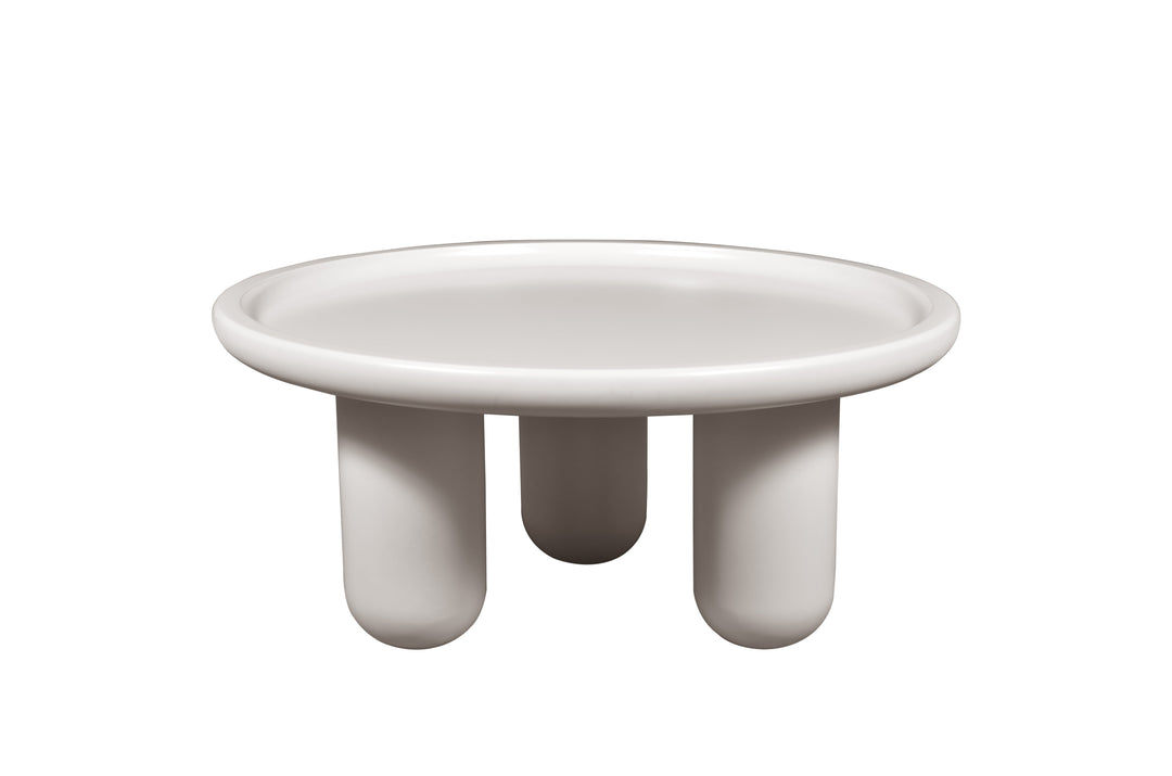 White ceramic dish with three legs on a white background