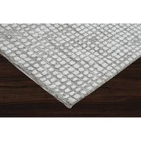 Gray textured area rug on a white background