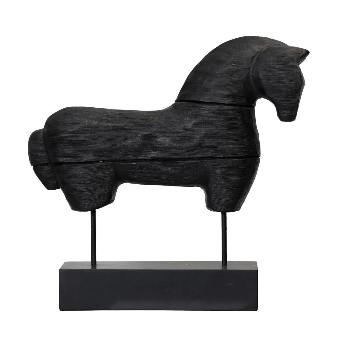 Black horse sculpture on a white background