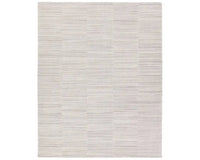 A rectangular, solid white area rug with a textured design