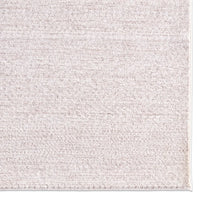 Textured gray rug with a subtle pattern on a white background