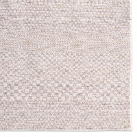 Textured beige carpet close-up