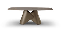 Modern brown table with unique base design on a white background