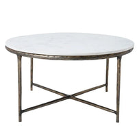 Round marble coffee table with a cast aluminum base featuring a natural white color and antique brass finish.