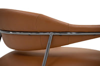 Brown leather chair with metal frame on a white background
