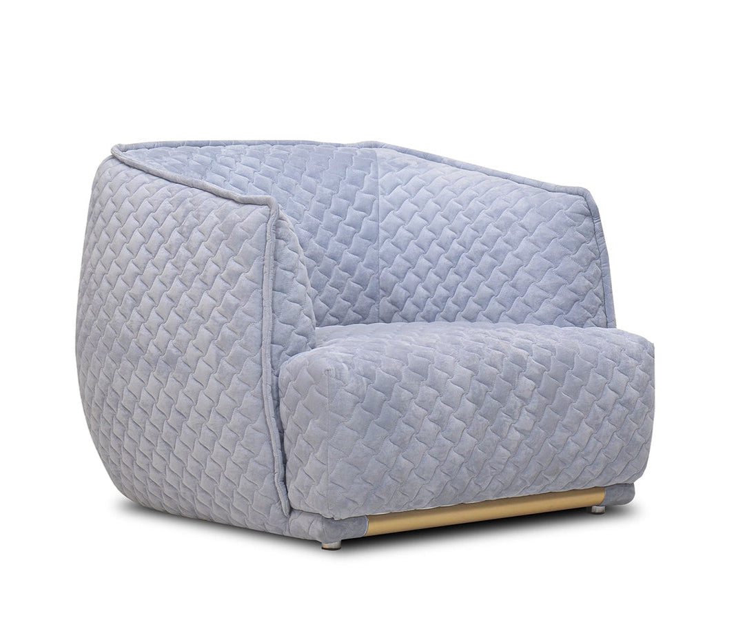 Quilted armchair on a white background