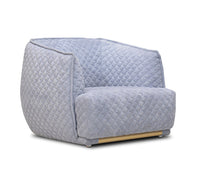 Quilted armchair on a white background