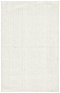 An ivory-colored area rug with a textured weave, partially showing its thickness and material.