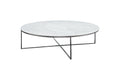Round marble coffee table with black metal legs on a white background