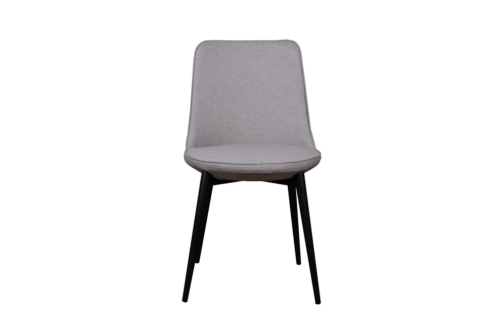 A gray upholstered dining chair with slim black matte finish steel legs.