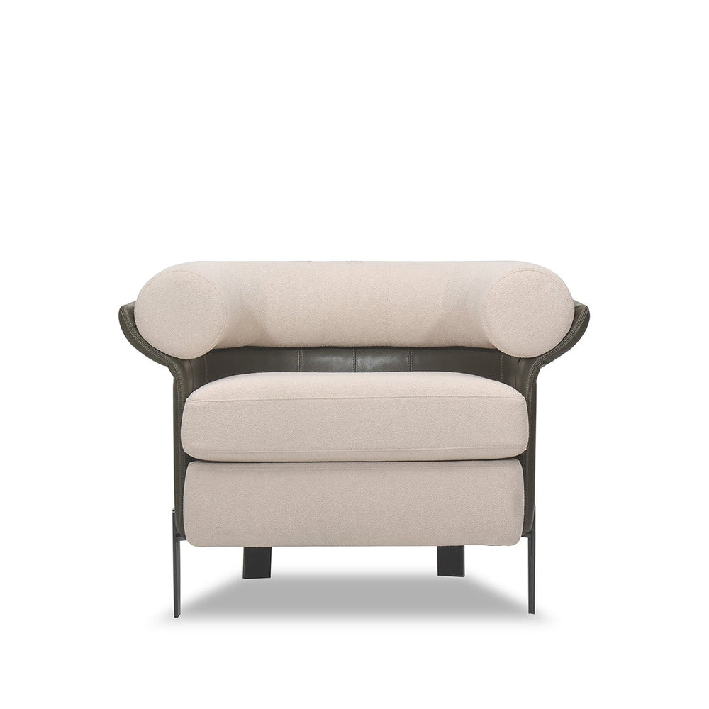 Beige armchair with black metal frame on a white background