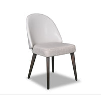 Gray upholstered chair with dark wooden legs on a white background