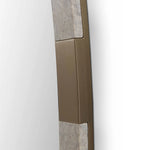 Close-up of a bronze door handle on a white door