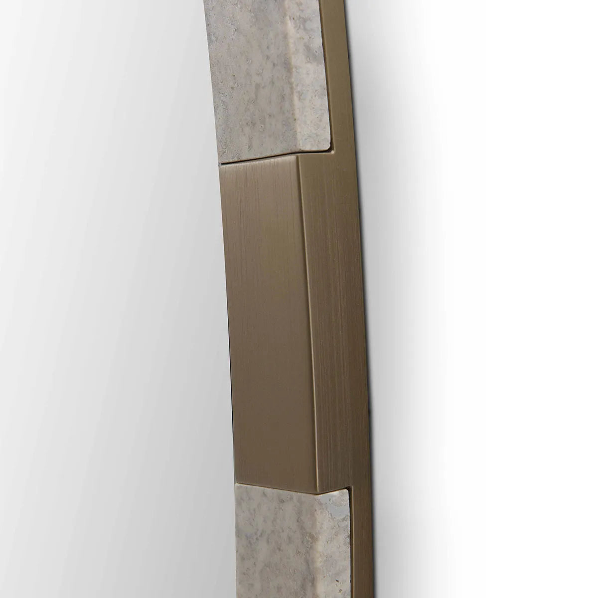 Close-up of a bronze door handle on a white door