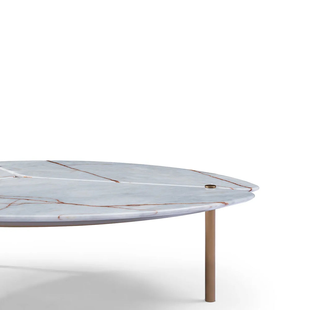 Round marble coffee table with a white and brown pattern on a white background