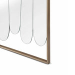 Close-up of a modern wall art piece with abstract design on a white background