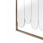 Close-up of a modern wall art piece with abstract design on a white background