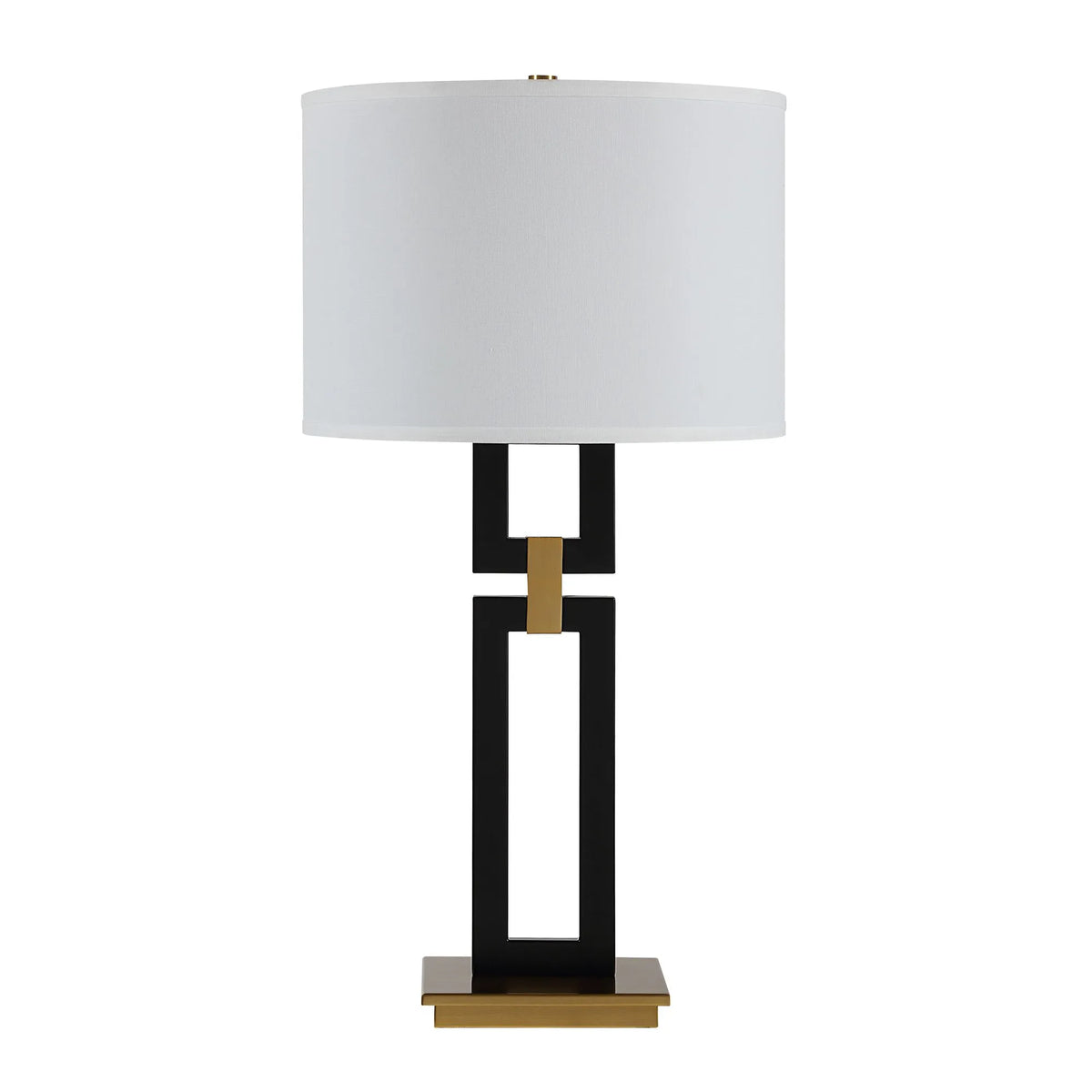 Table lamp with a white shade, black and gold base on a white background