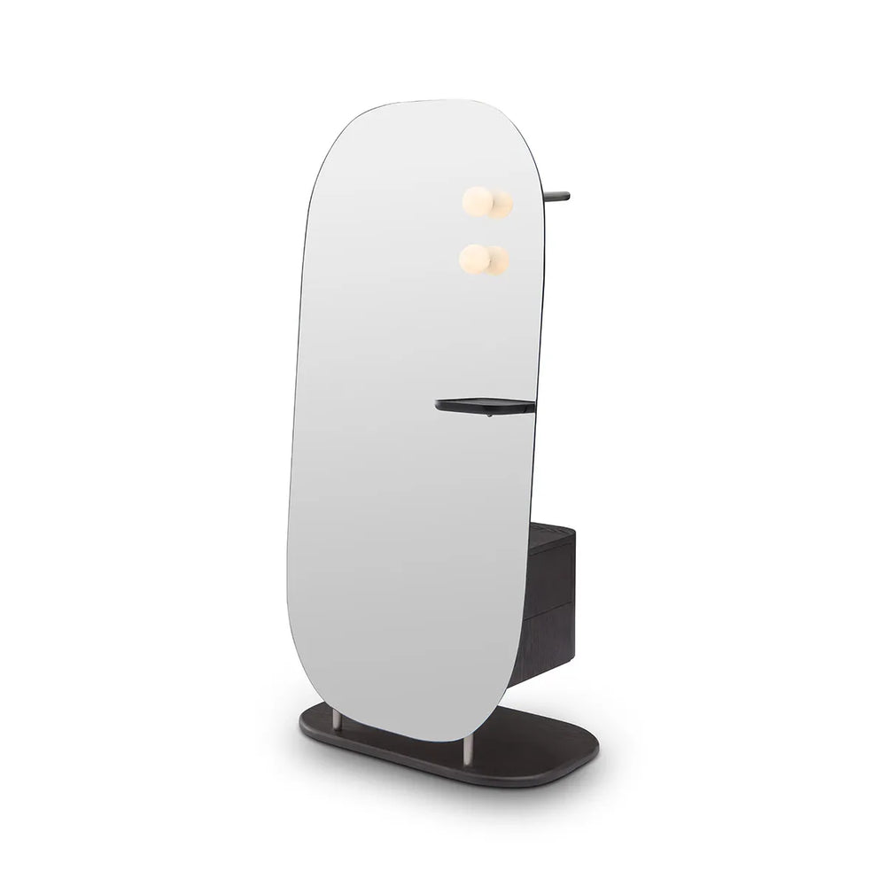 Modern floor lamp with a white shade and black base on a white background
