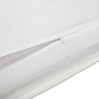 Close-up of a white fabric with a zipper on a white background