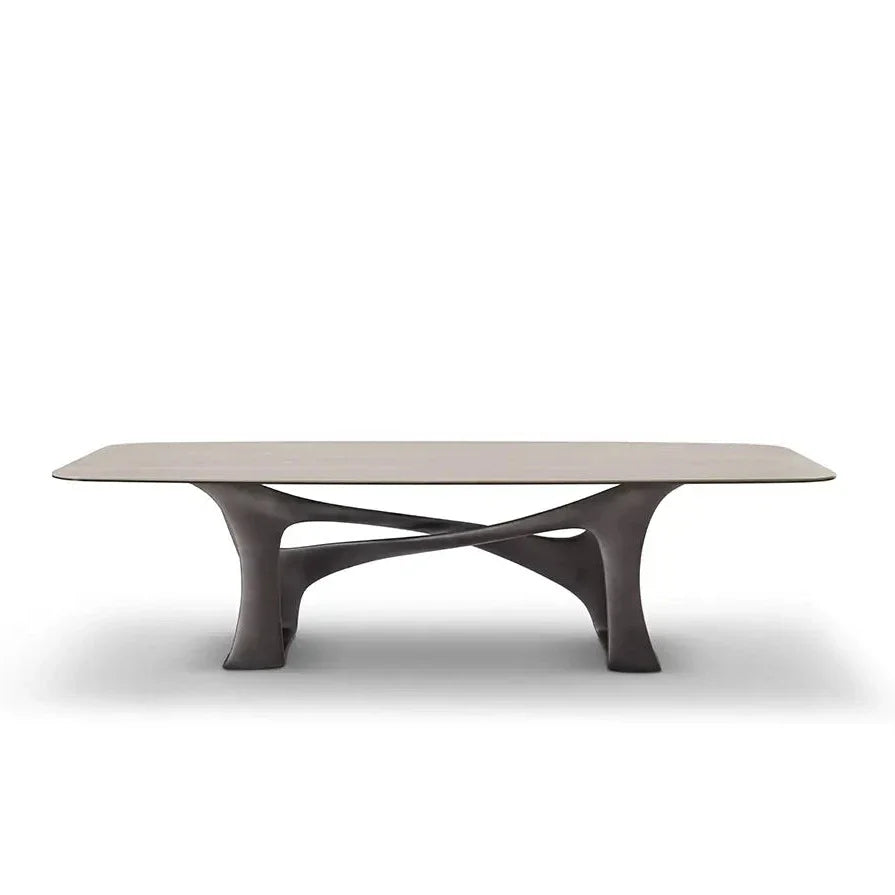 Modern coffee table with a unique base design on a white background
