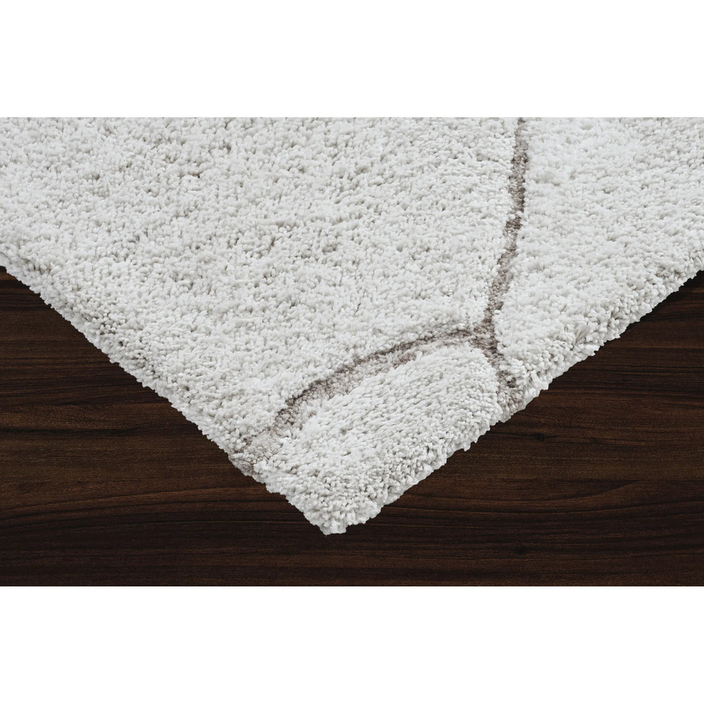 Textured gray area rug on a white background