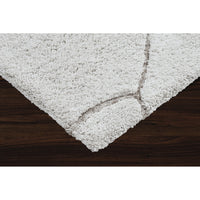 Textured gray area rug on a white background