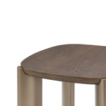 Wooden stool with metal legs on a white background