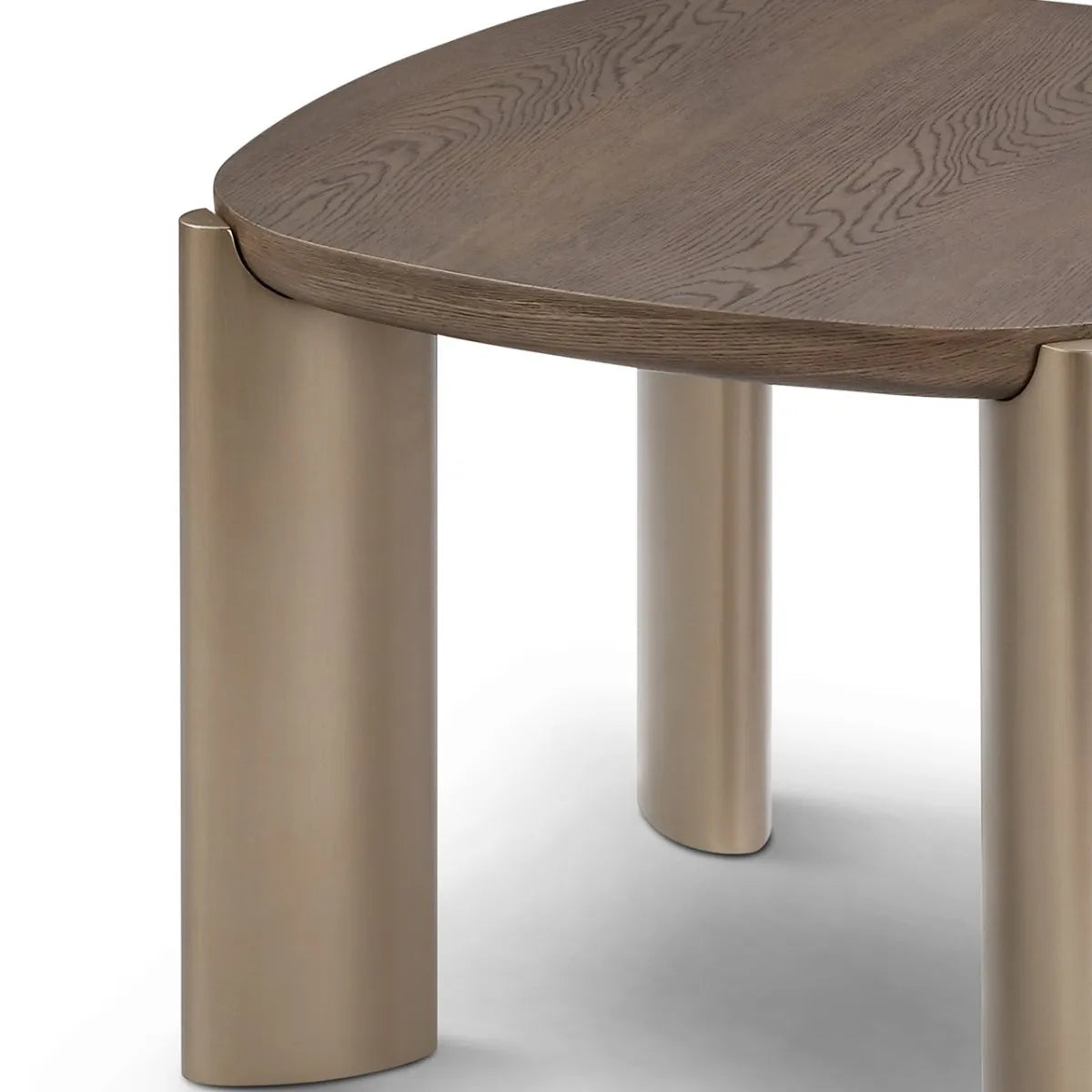 Wooden table with bronze legs on a white background