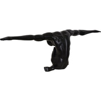 Black abstract sculpture of a figure on a white background