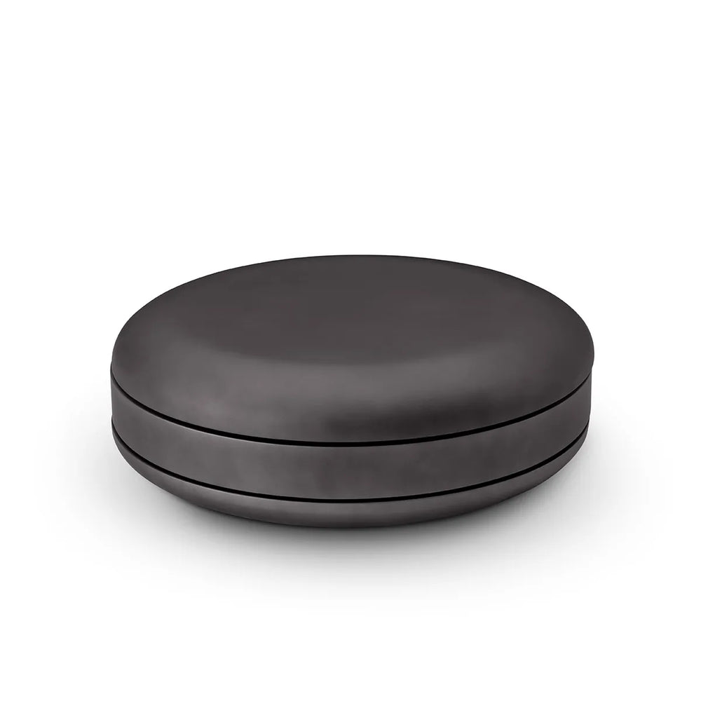 Black round container on a white background