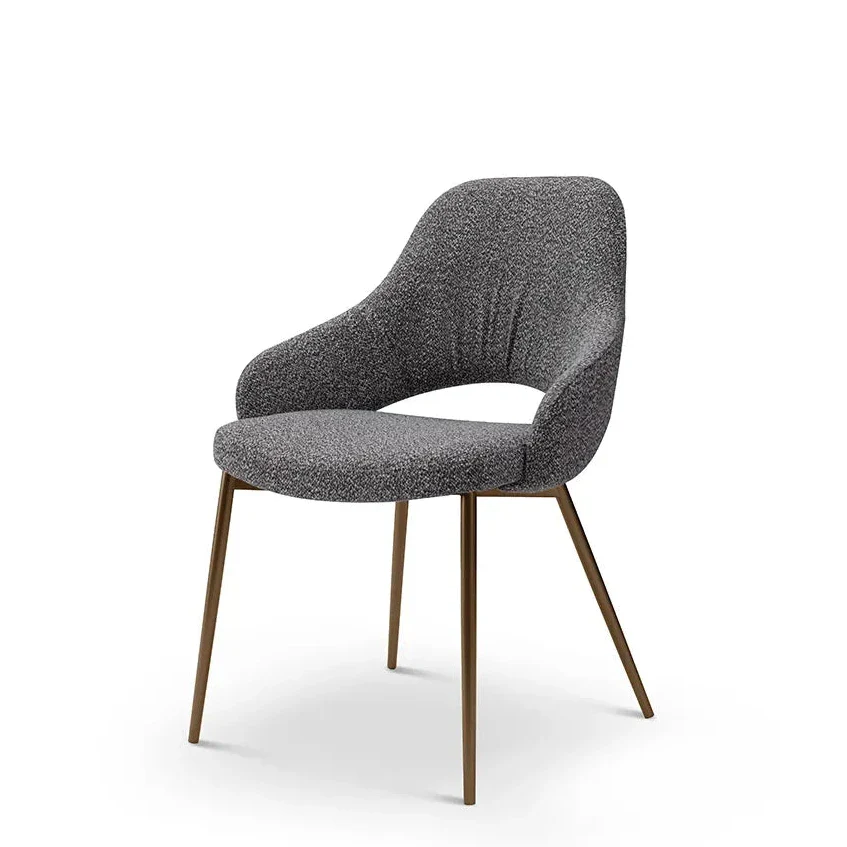 Gray upholstered chair with bronze legs on a white background