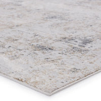 Textured rug with a neutral color palette on a white background
