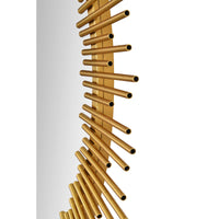 A round decorative mirror with a gold leaf finish frame designed to resemble a sunburst.