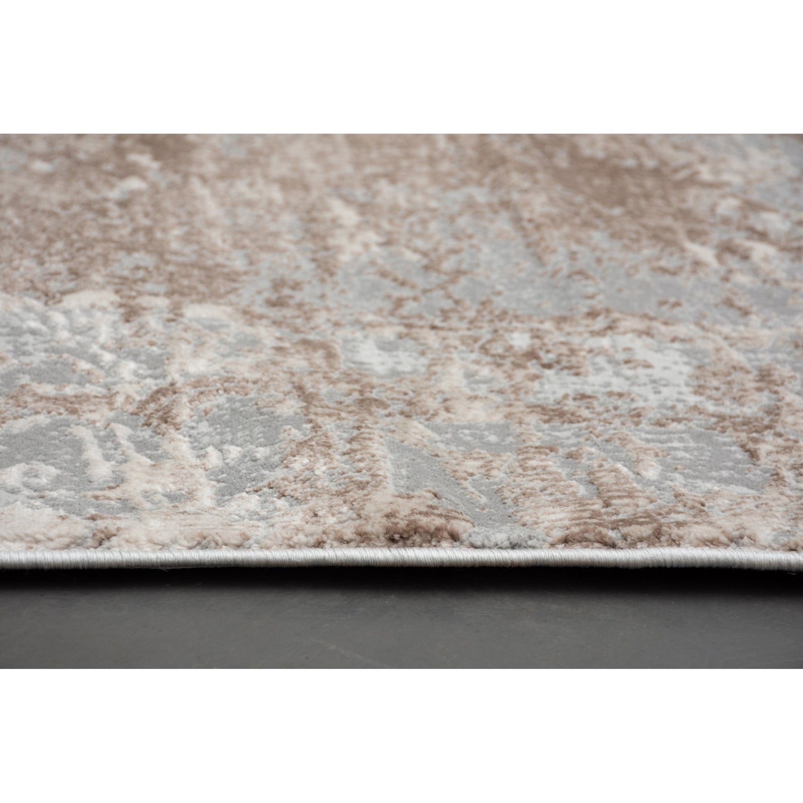 A rectangular area rug featuring a subtle pattern with muted brown and grey tones, suitable for contemporary living or bedroom spaces.