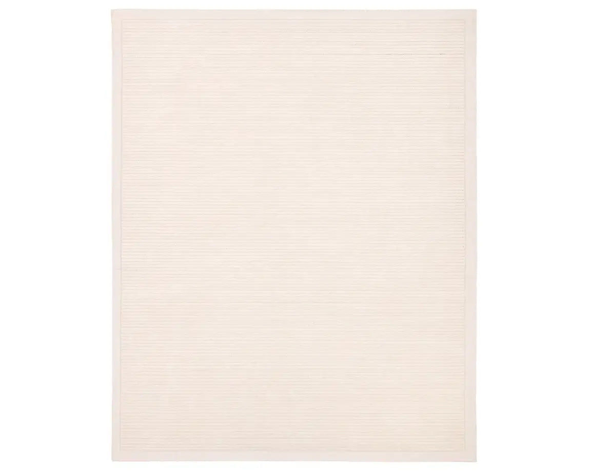 A beige, solid-colored area rug with a visible texture.