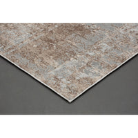 Patterned rug on a gray background