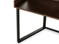 Wooden desk with black metal legs on a white background