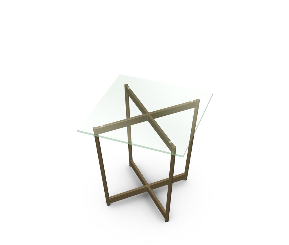 Modern glass table with geometric metal frame on a white background
