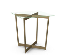 Glass table with gold metal frame on a white background