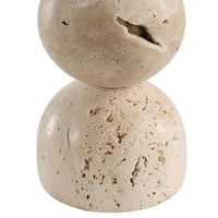 Two stacked stone spheres on a white background