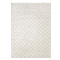 Textured white rug on a white background