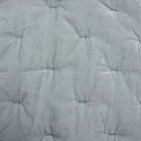 Close-up of a textured gray fabric surface
