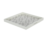 A white ivory serving tray with a geometric pattern.