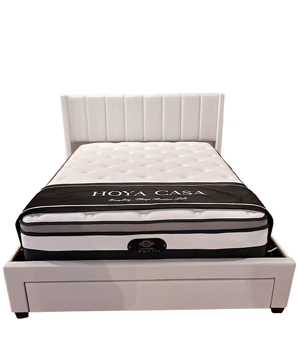 White bed with Hoya Casa mattress on a white background