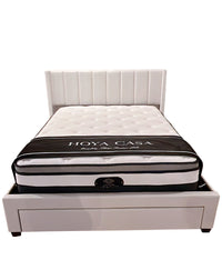 White bed with Hoya Casa mattress on a white background